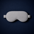 Silk Sleep Mask on dark surface