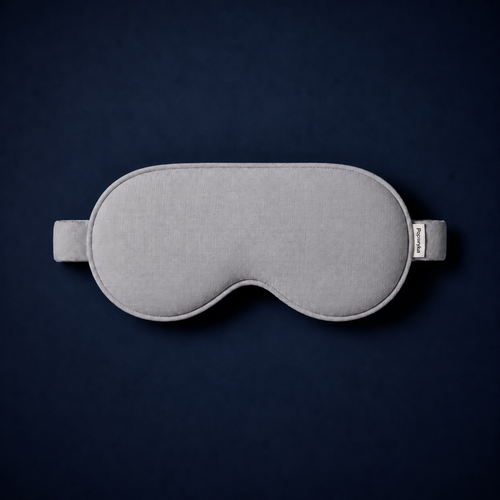 Silk Sleep Mask on dark surface