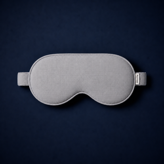 Silk Sleep Mask on dark surface
